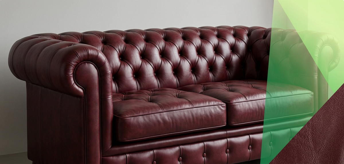A classic Chesterfield-style leather sofa in deep burgundy, featuring deep button tufting on the backrest and seat, shown against a neutral gray wall with a green graphic overlay on the right side.