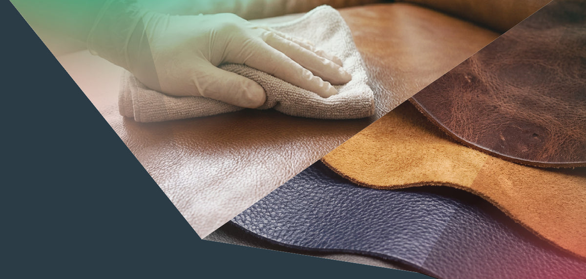 A close-up of a gloved hand wiping a light-colored leather surface, with several leather material swatches layered beneath and around it.